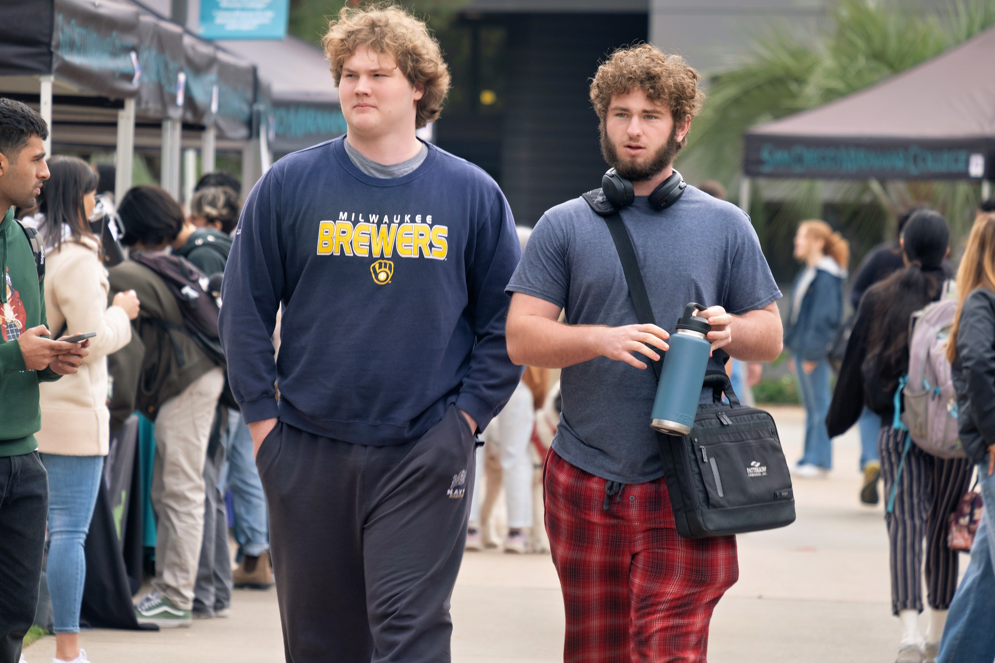 
Two students walking at Miramar College.
