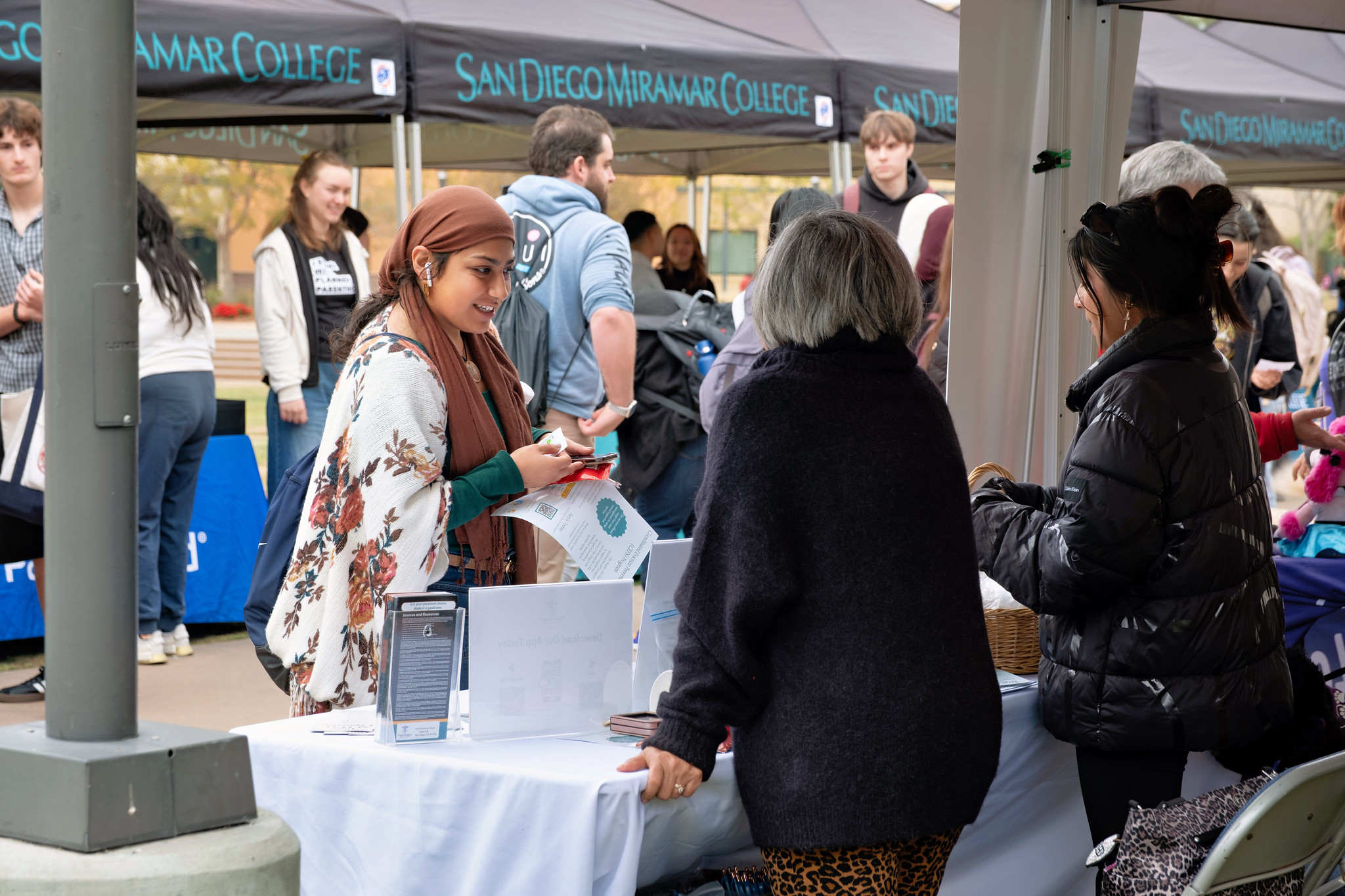 
A student stops by a booth Miramar's welcome week.
