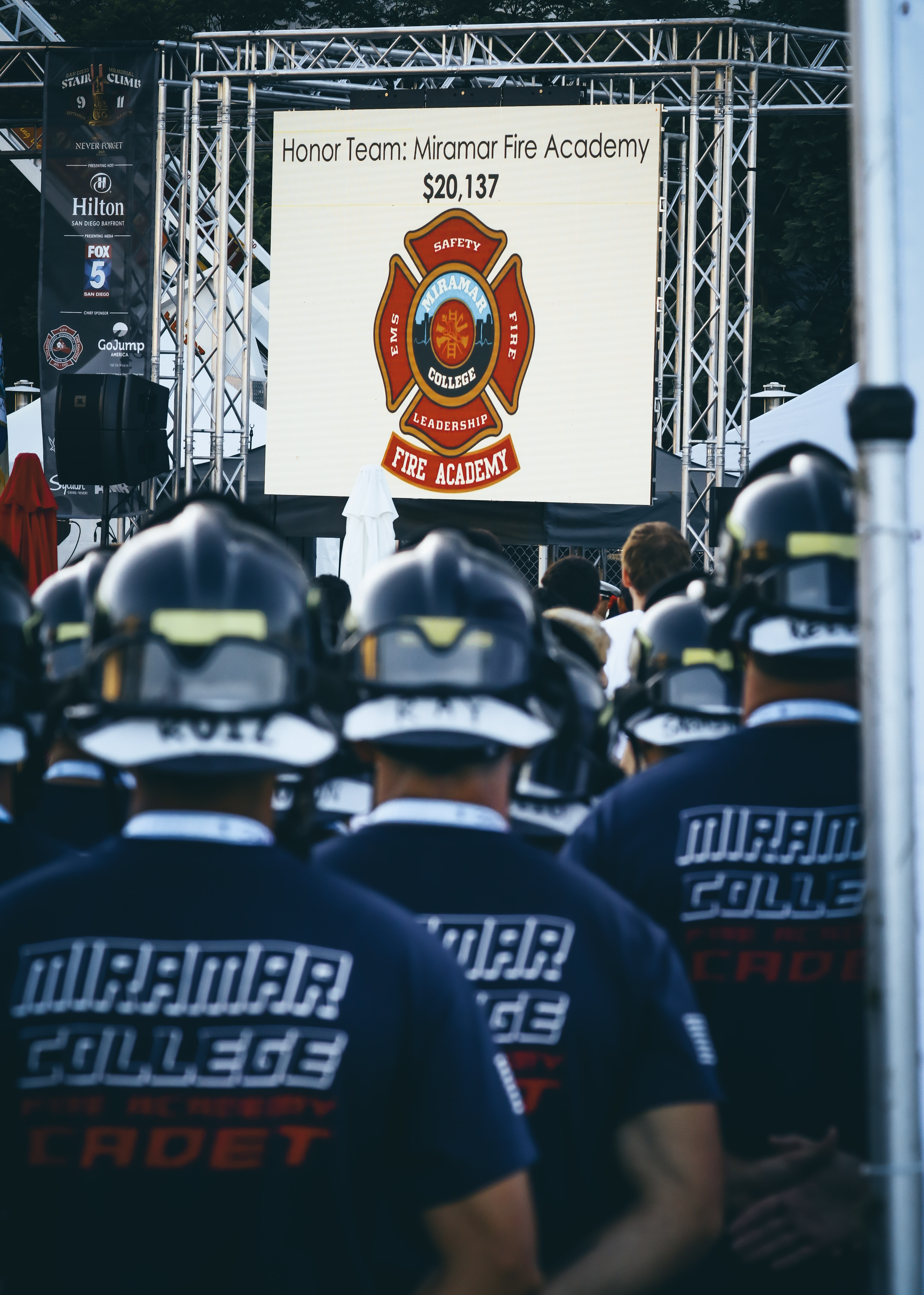 
Participants watch a presentation.
