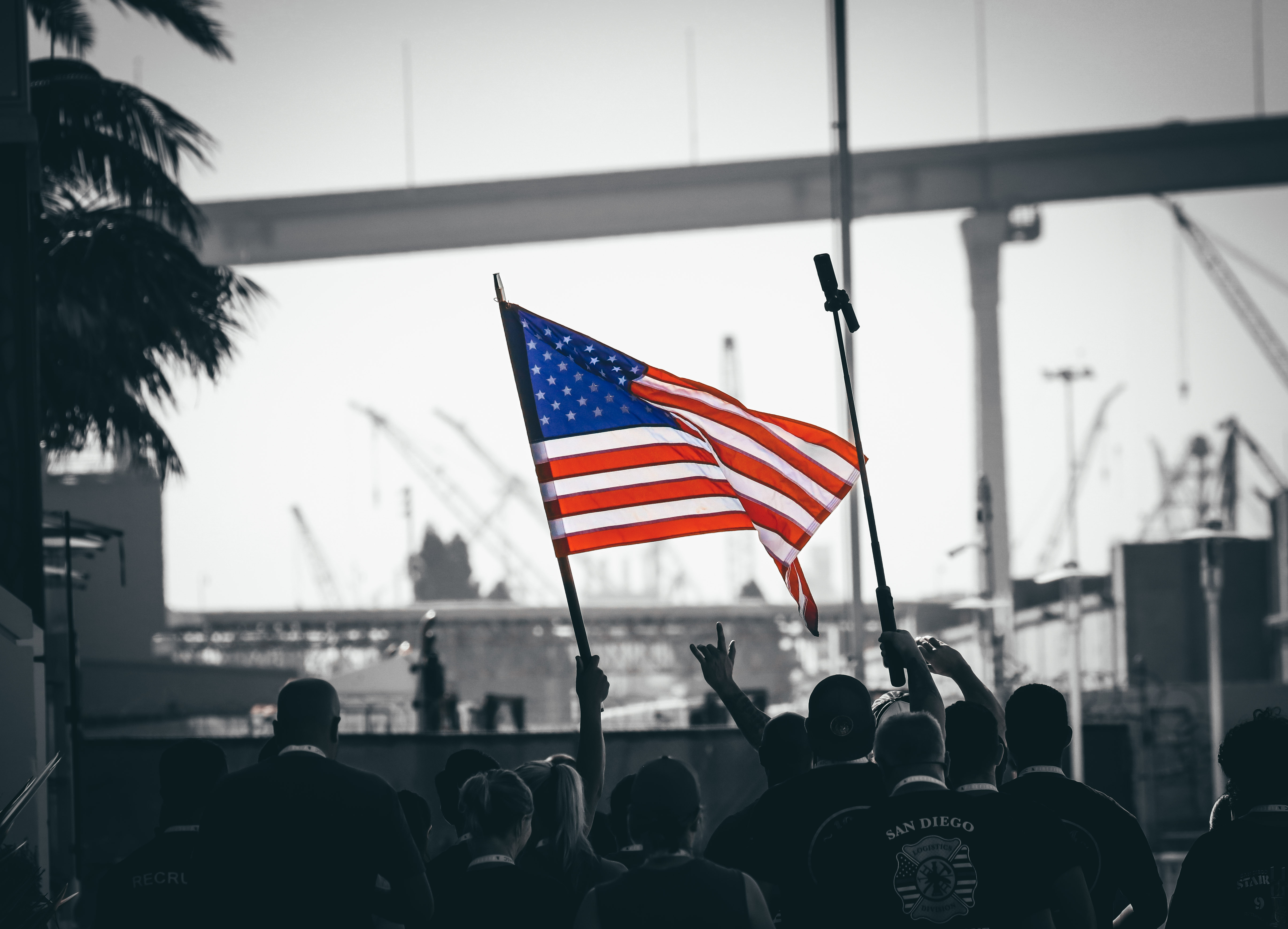 
Participants in the Stair Climb carry an American flag.&nbsp;
