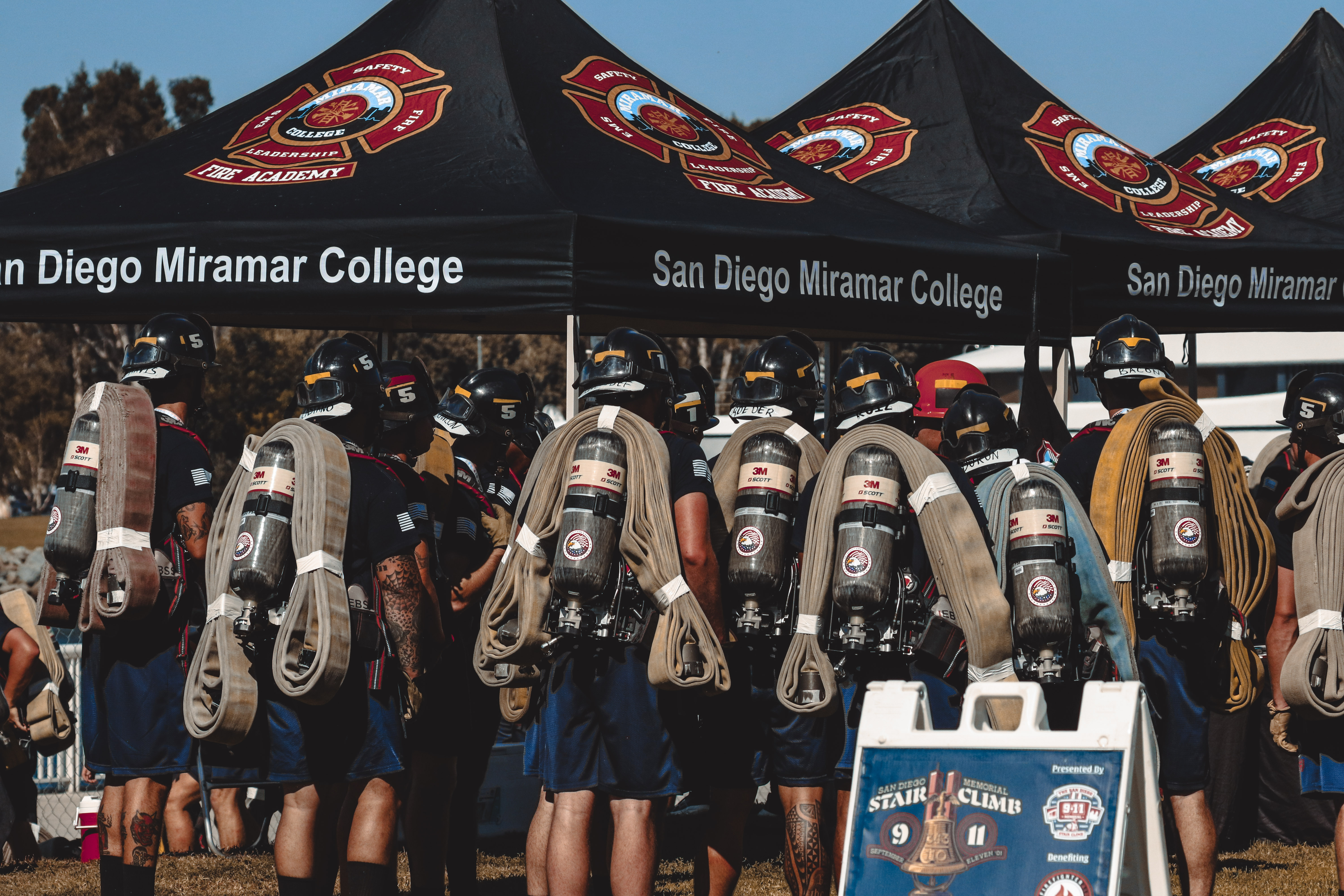 
A group of cadets neare three Miramar College tents at the event.
