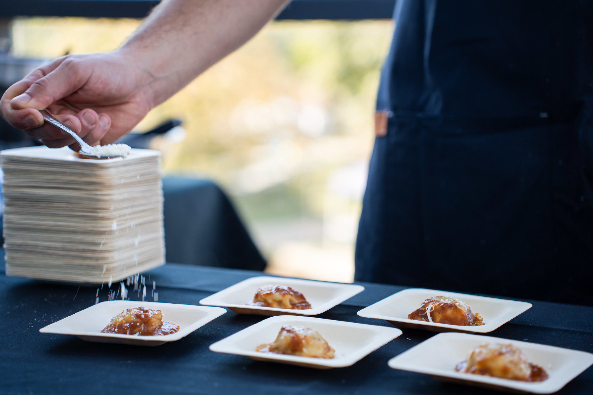 
A chef preparing samples.
