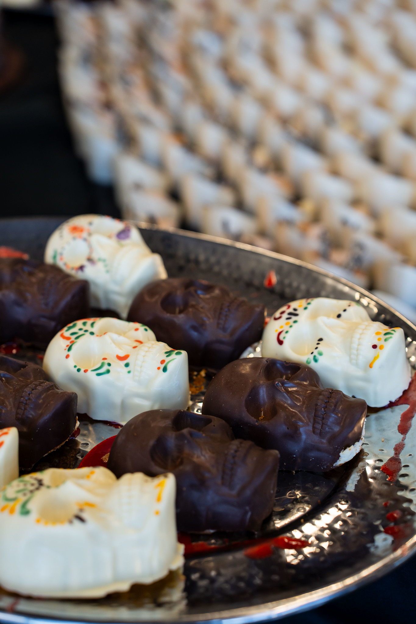 
A tray of chocolate skeleton heads.
