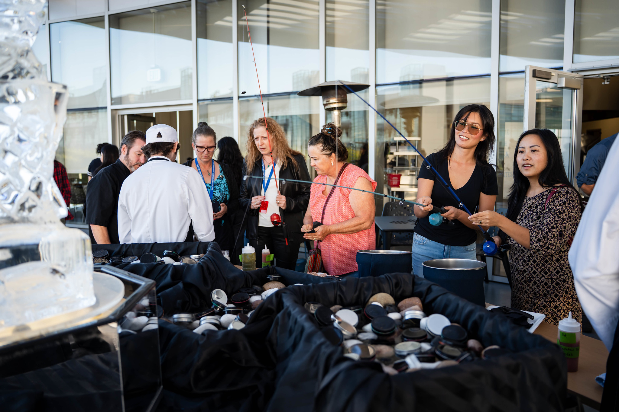 
Five people line up for a sample.
