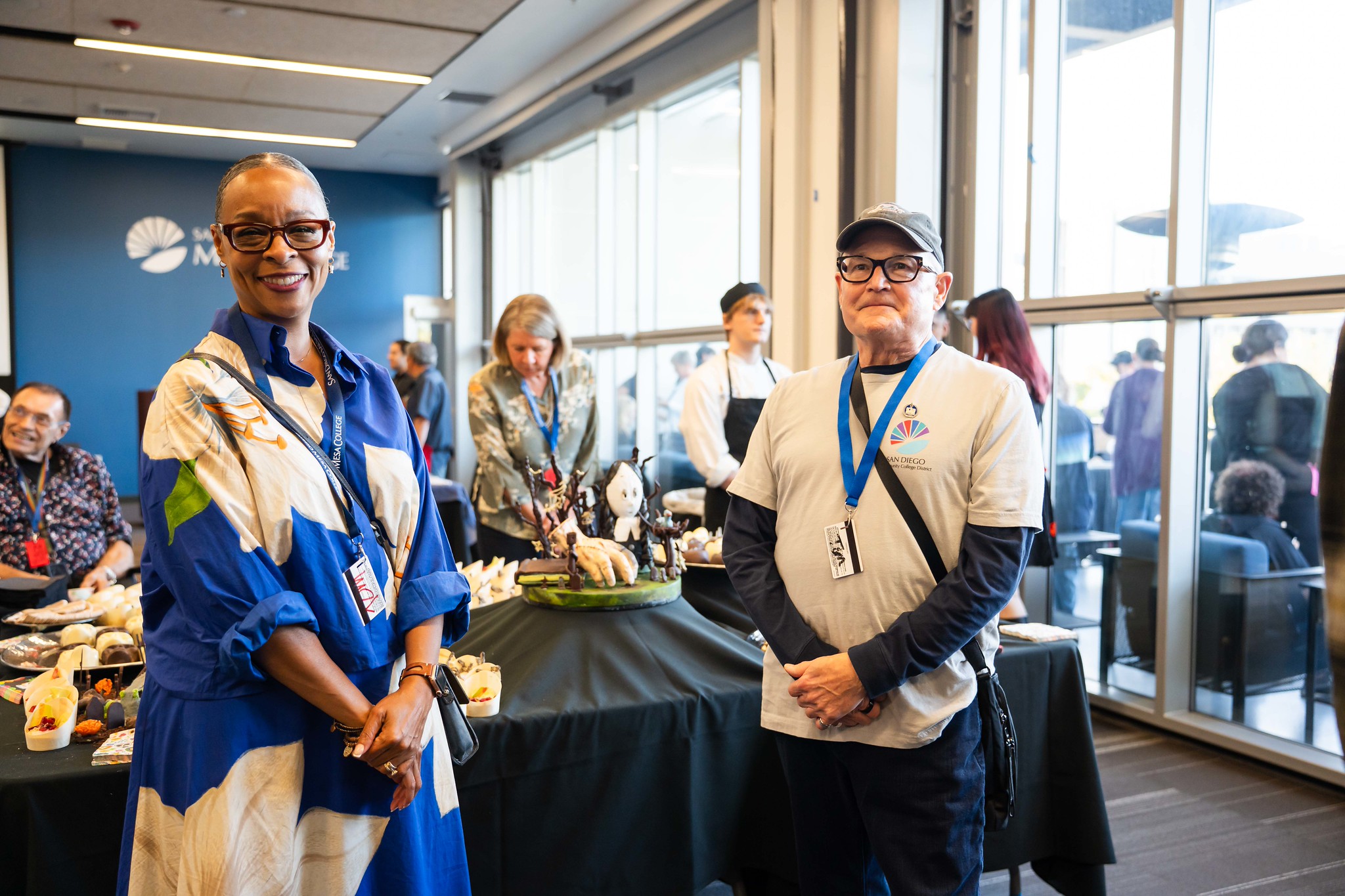 
Mesa College President Ashanti Hands with Trustee Craig Milgrim.
