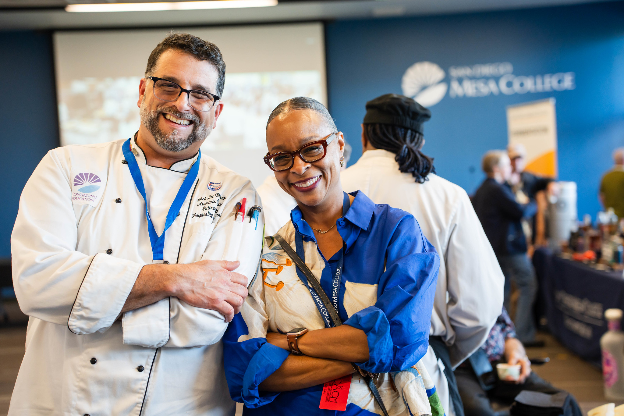 
Dr. Ashanti Hands with a chef. 
