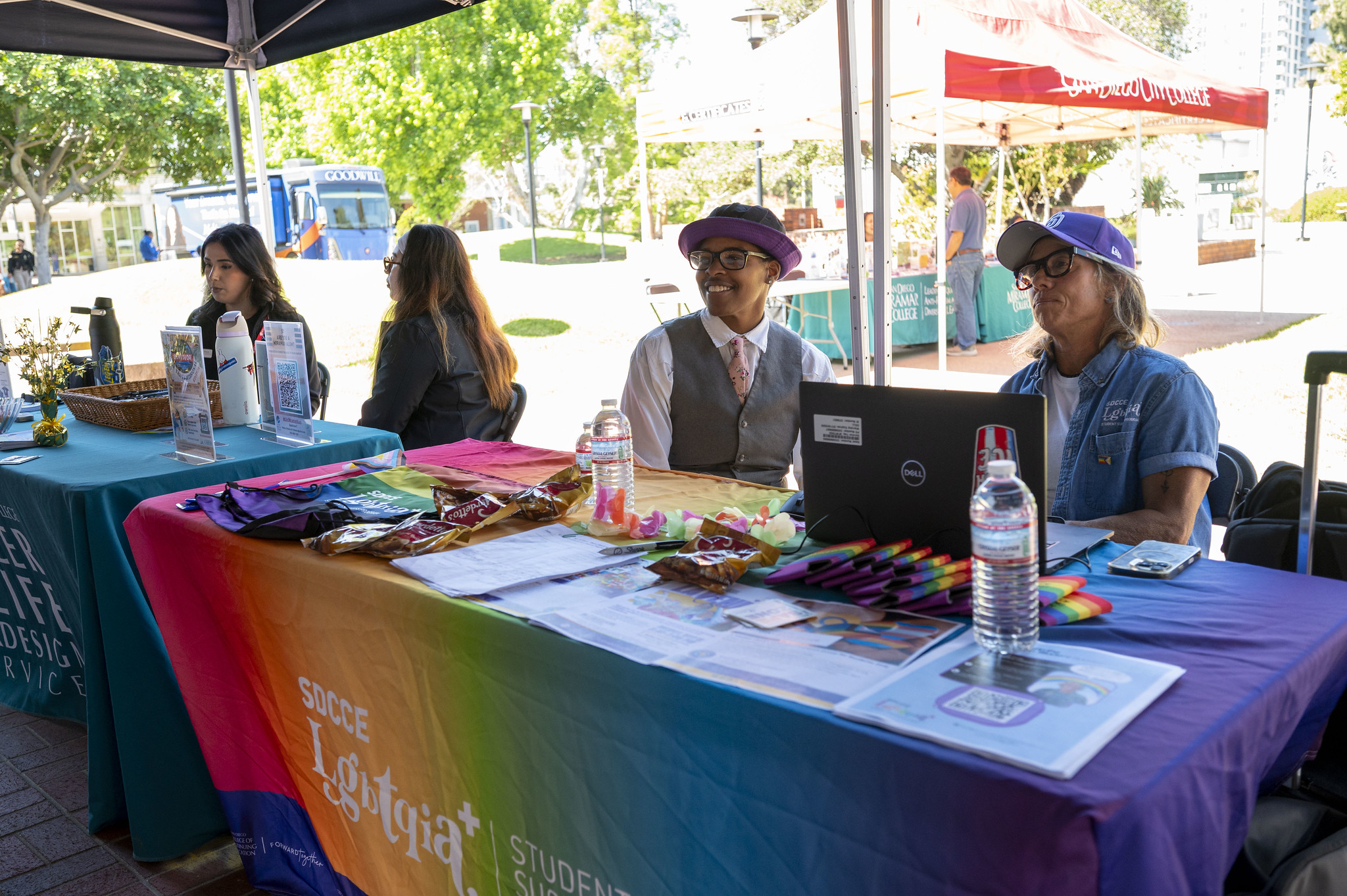 Two people working a booth at the career fair.