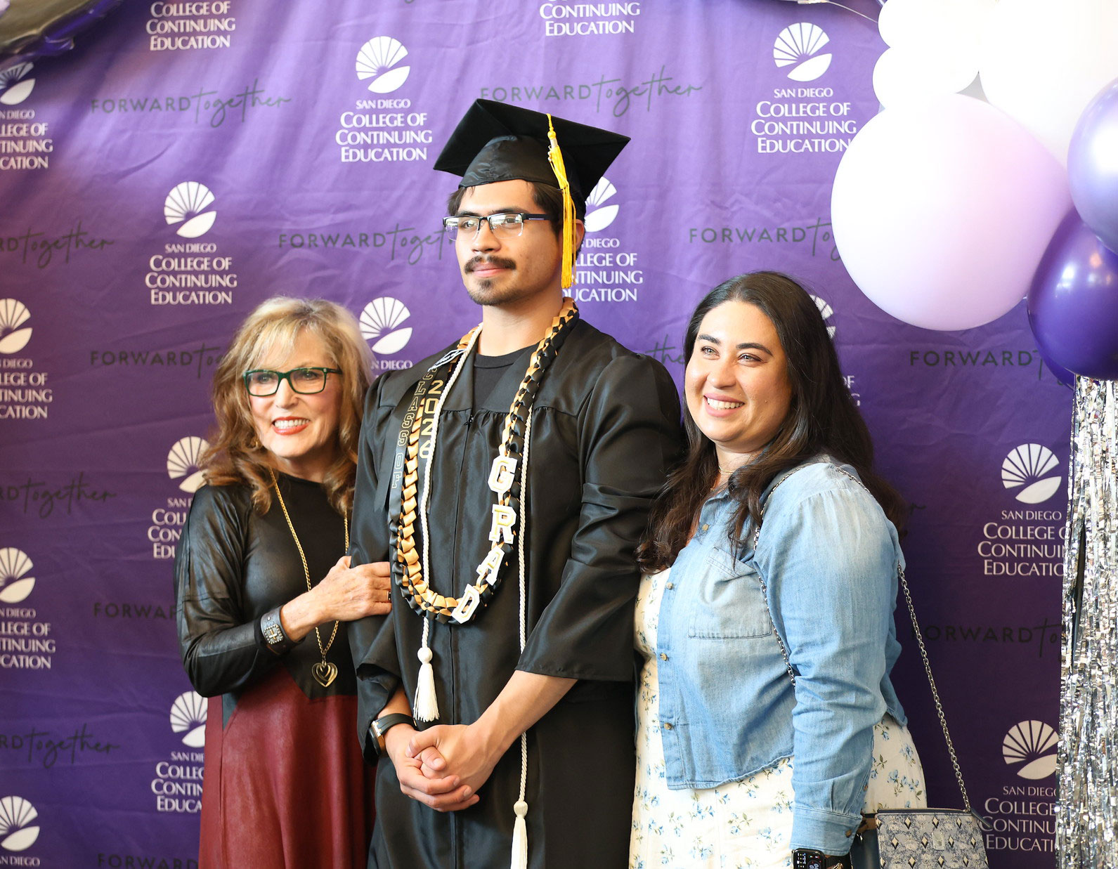 A graduate with his family.