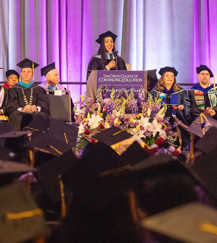 College of Continuing Education President Tina King speaks at the podium.