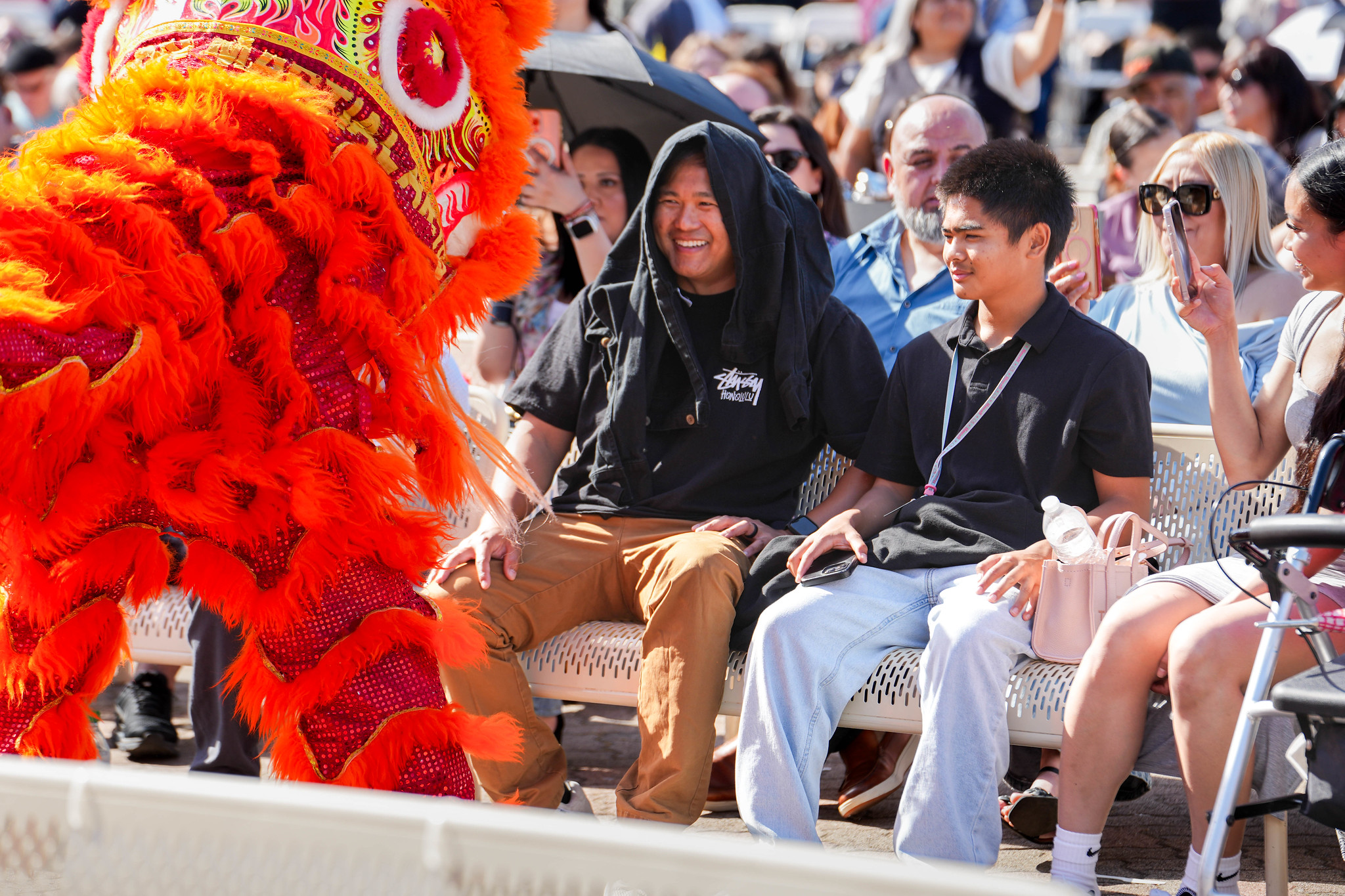 A Chinese dragon approaches an audience member.&nbsp;