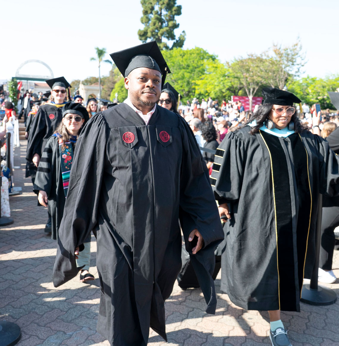 A graduate heads to his seat.&nbsp;