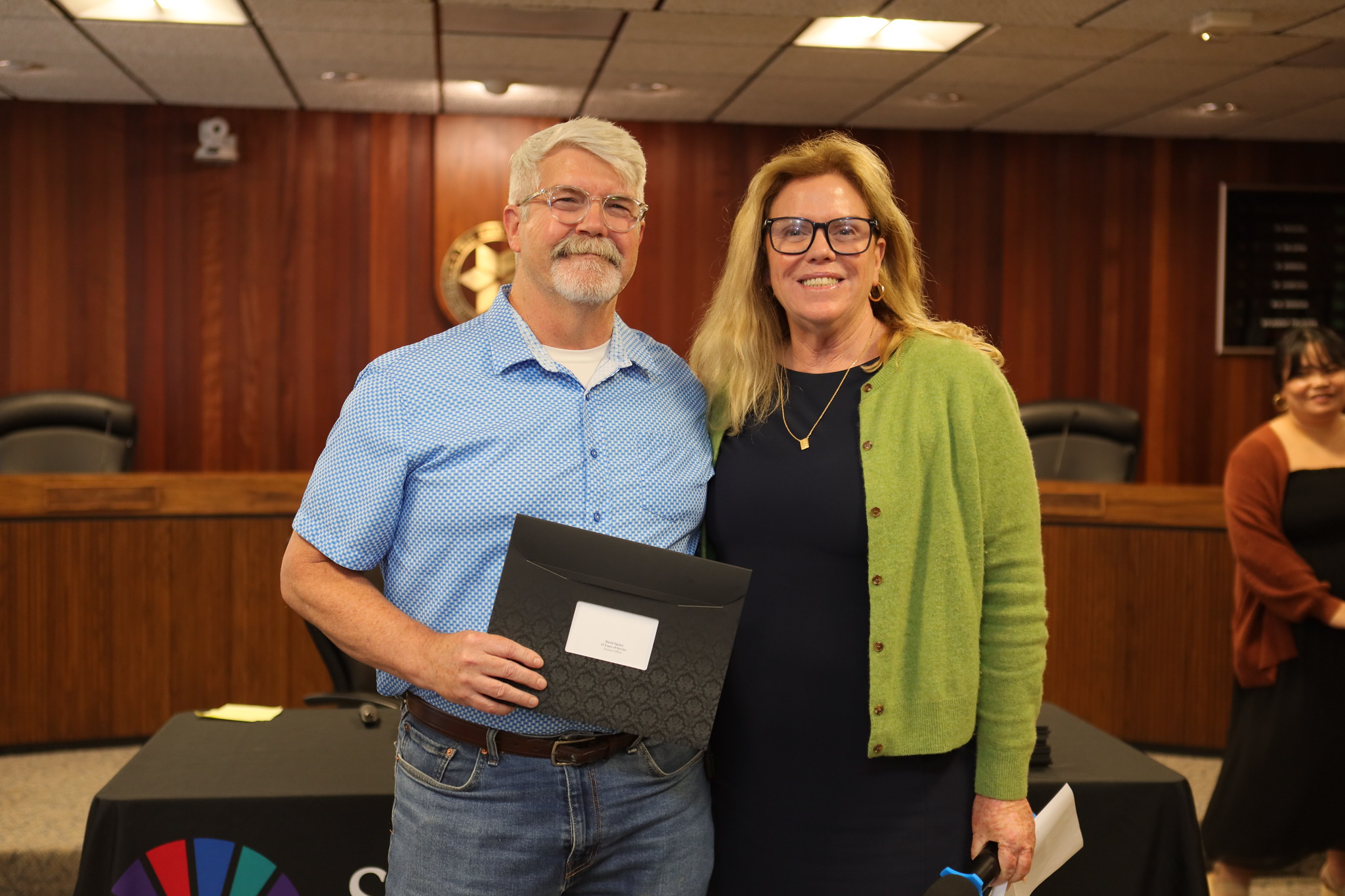 
Vice Chancellor Susan Topham presents a service award to David Spence.
