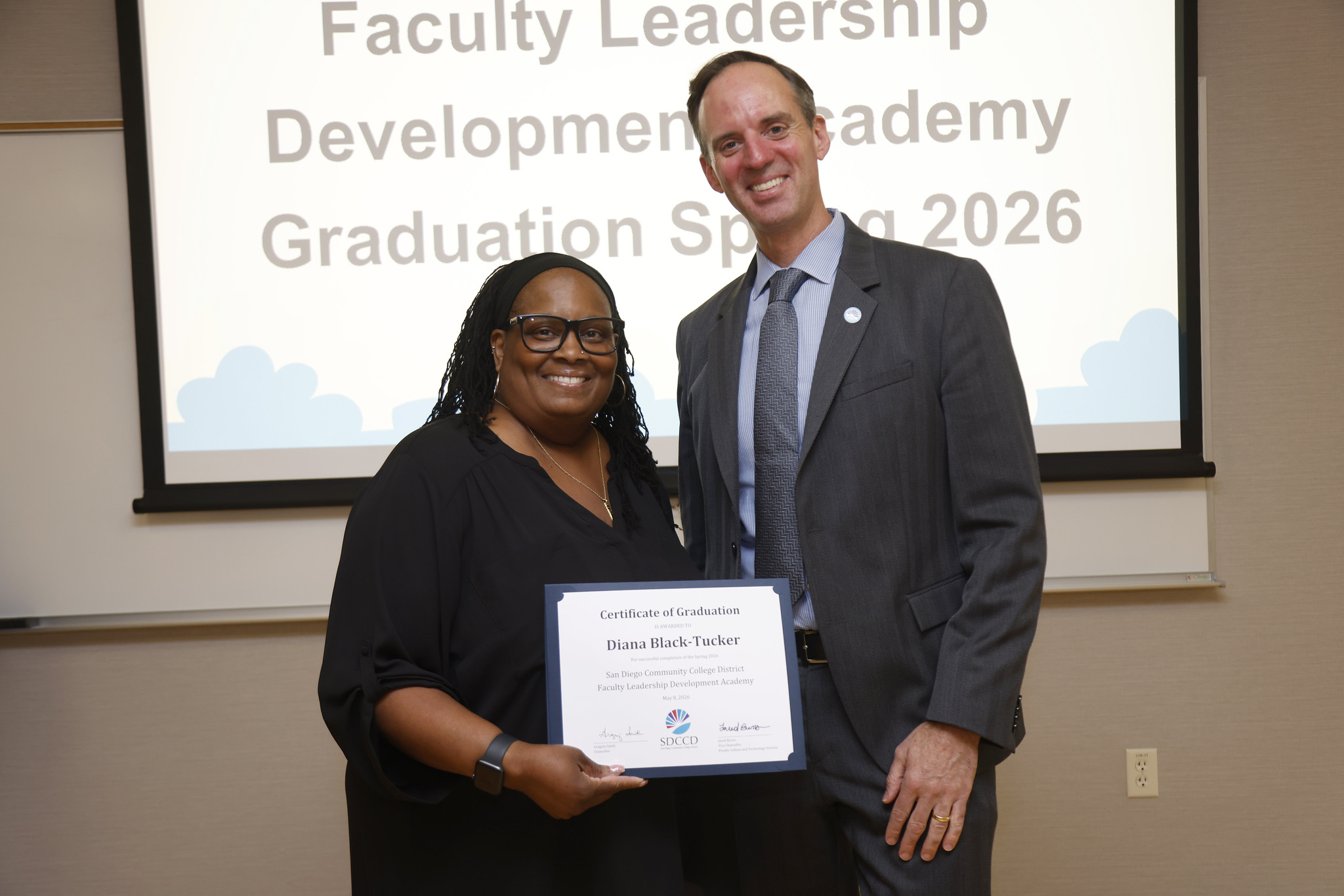 Diana Black-Tucker with Chancellor Gregory Smith at the academy certificate presentation.
