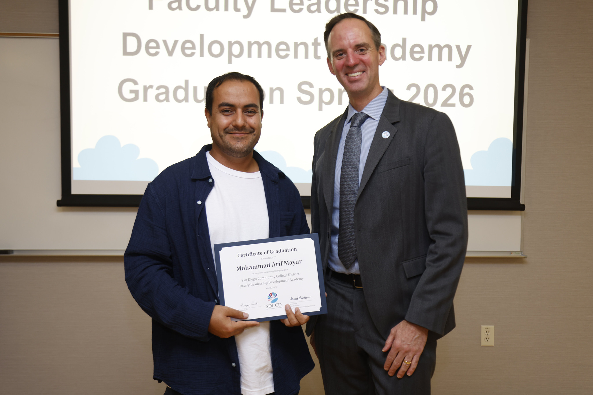 Mohammad Arif Mayar with Chancellor Gregory Smith at the academy certificate presentation.