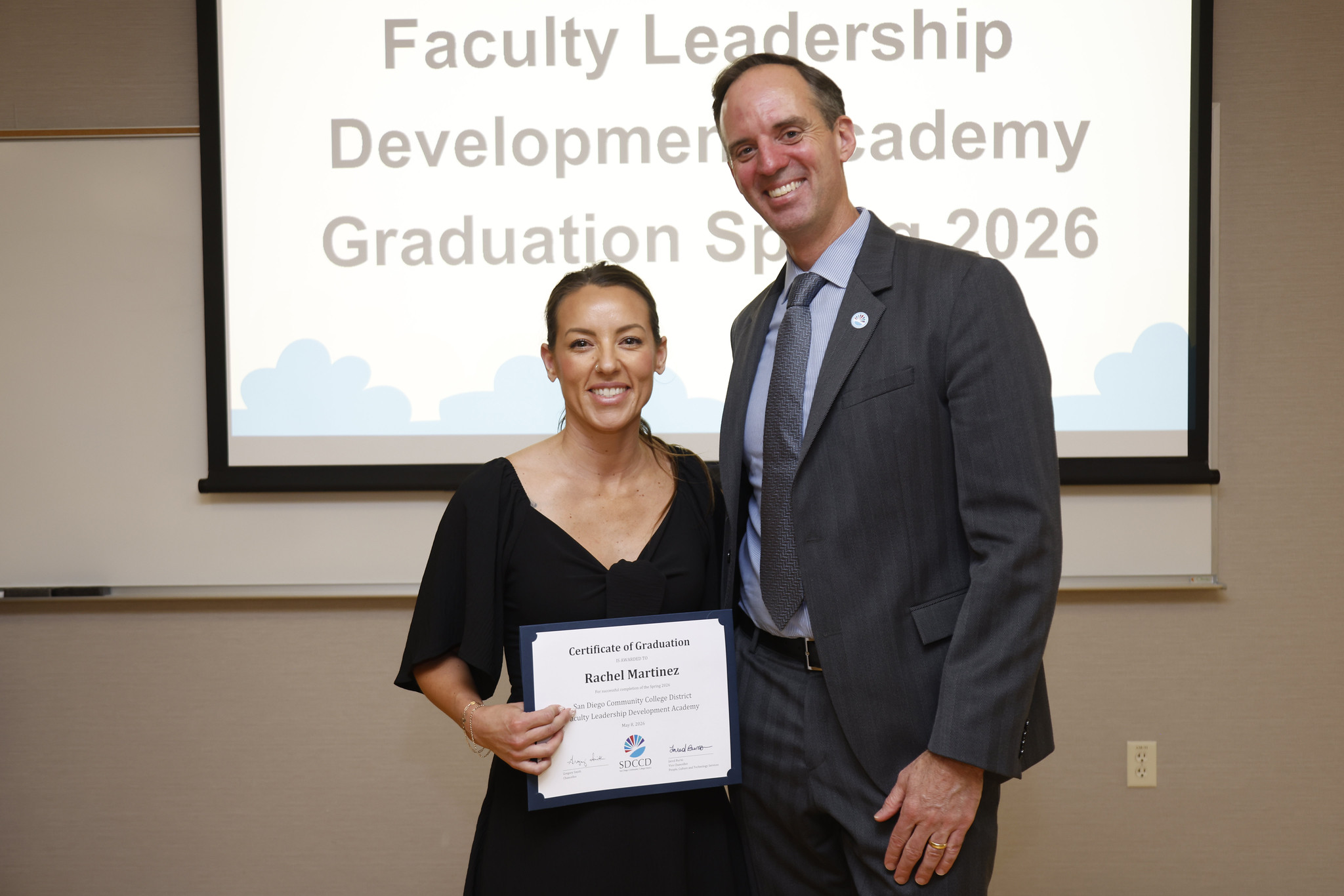 Rachel Martinez with Chancellor Gregory Smith at the academy certificate presentation.
