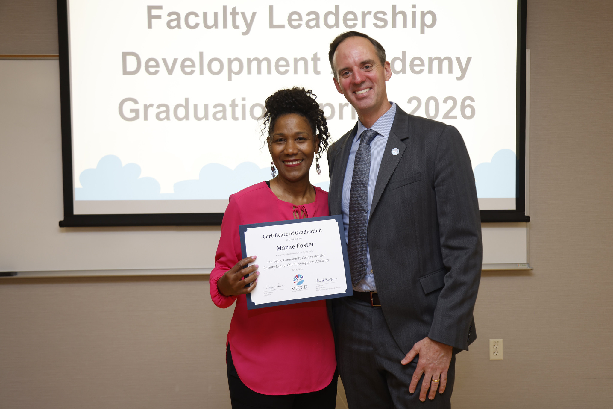 Marne Foster with Chancellor Gregory Smith at the academy certificate presentation.