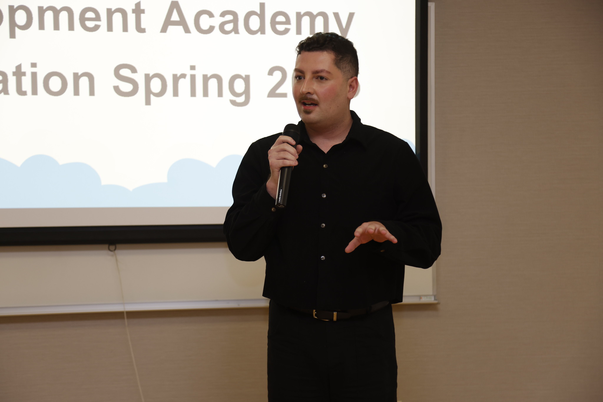 Dr. Lucio Lira speaks to the academy.