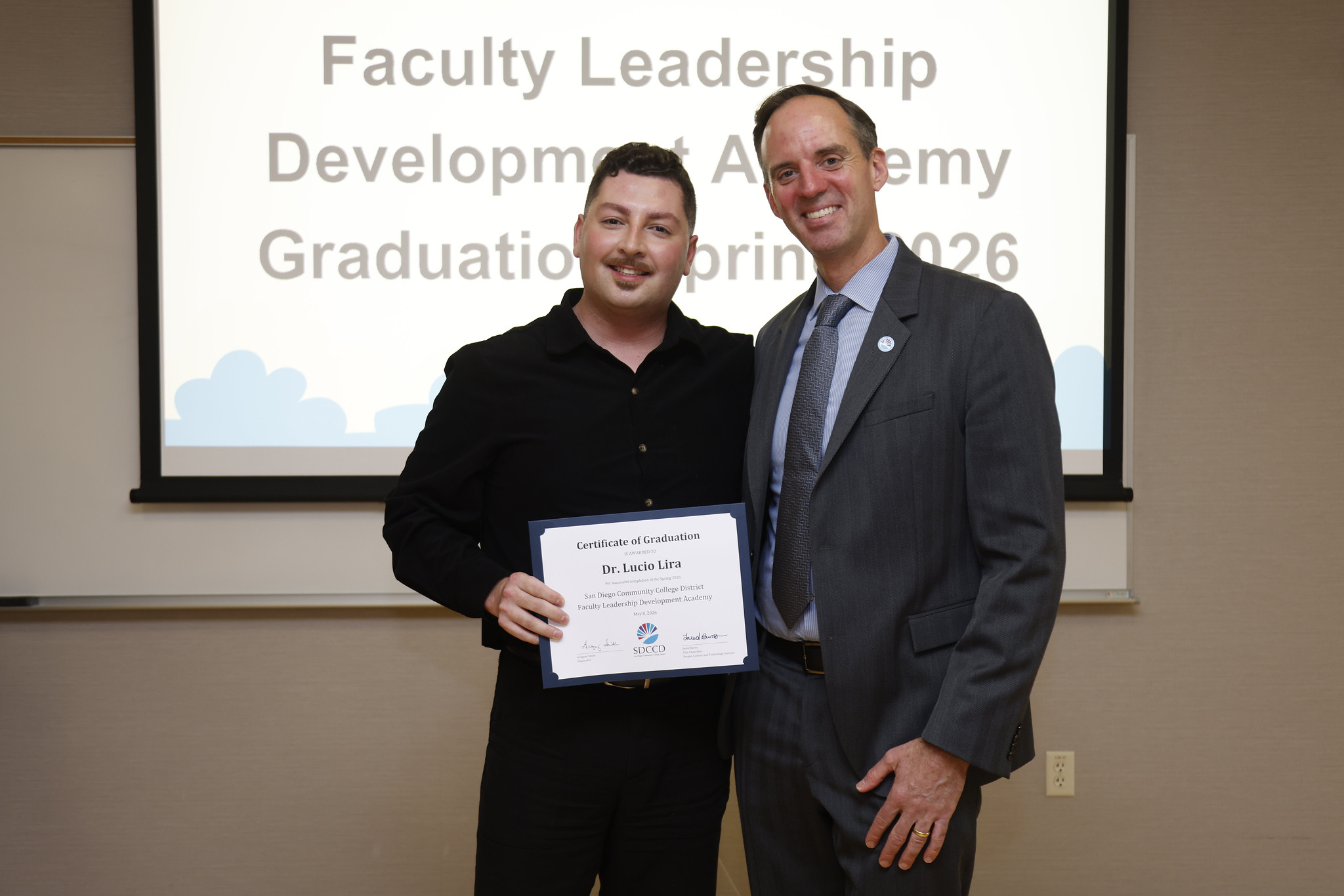 Dr. Lucio Lira with Chancellor Gregory Smith at the academy certificate presentation.
