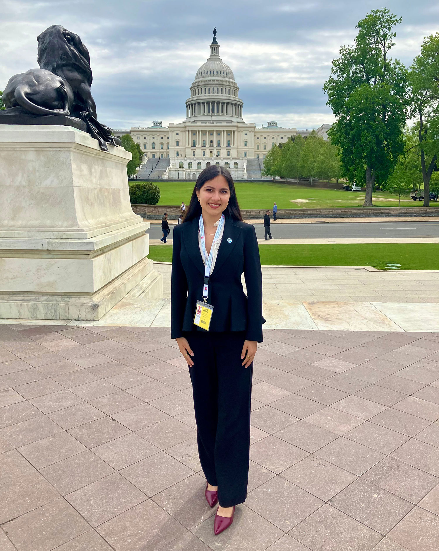 Student Trustee and Associated Students President Celina Martinez in front of the Capitol Building.