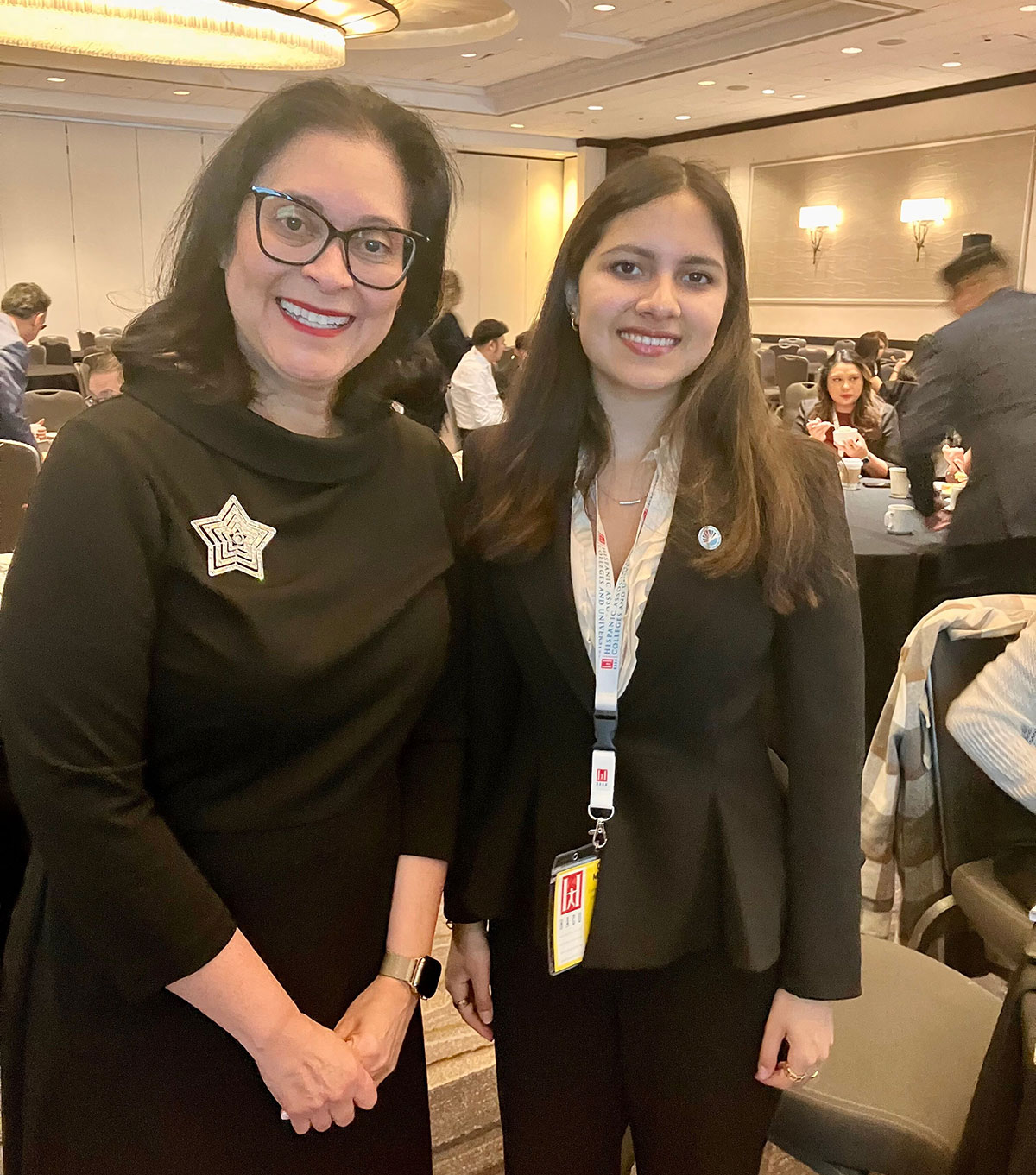 Student trustee Celina Martinez and another attendee at the forum.