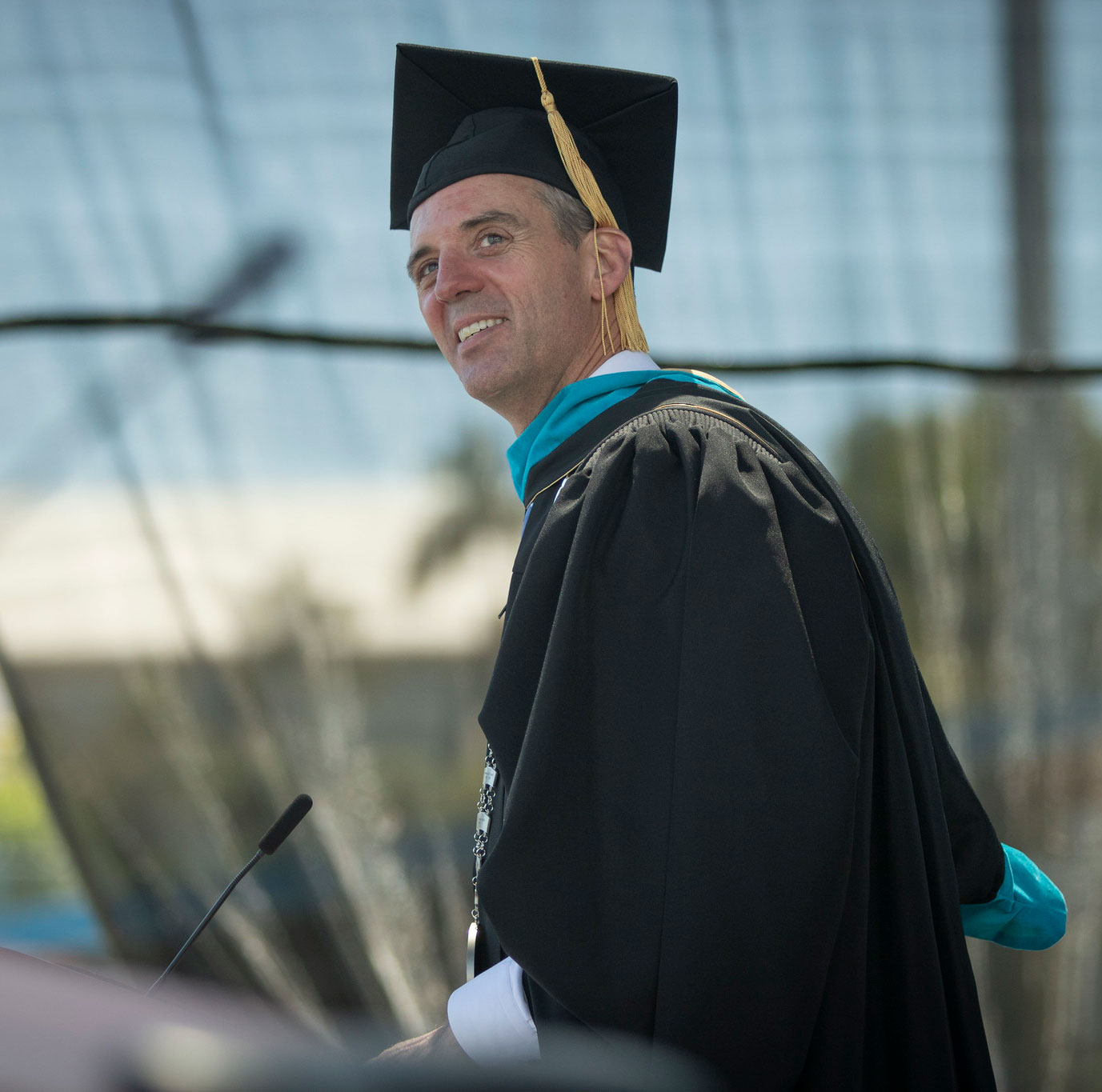Chancellor Gregory Smith speaking at a podium.&nbsp;