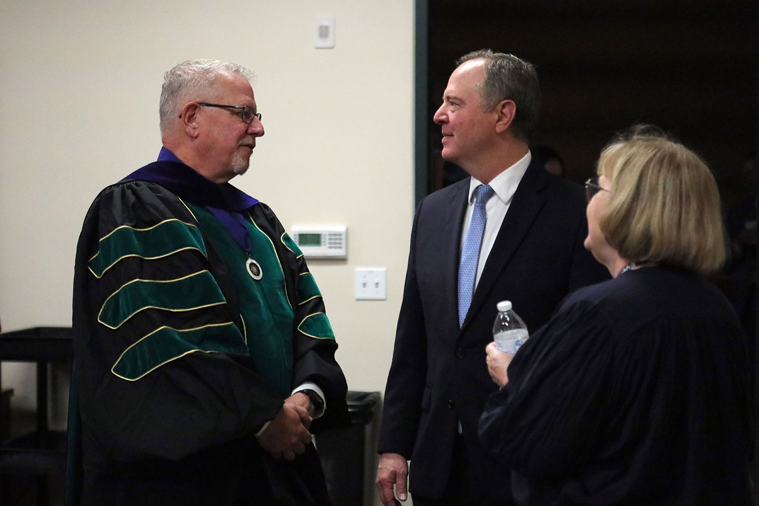 U.S. Senator Adam Schiff speaks with Miramar President Wes Lundburg before commencement.