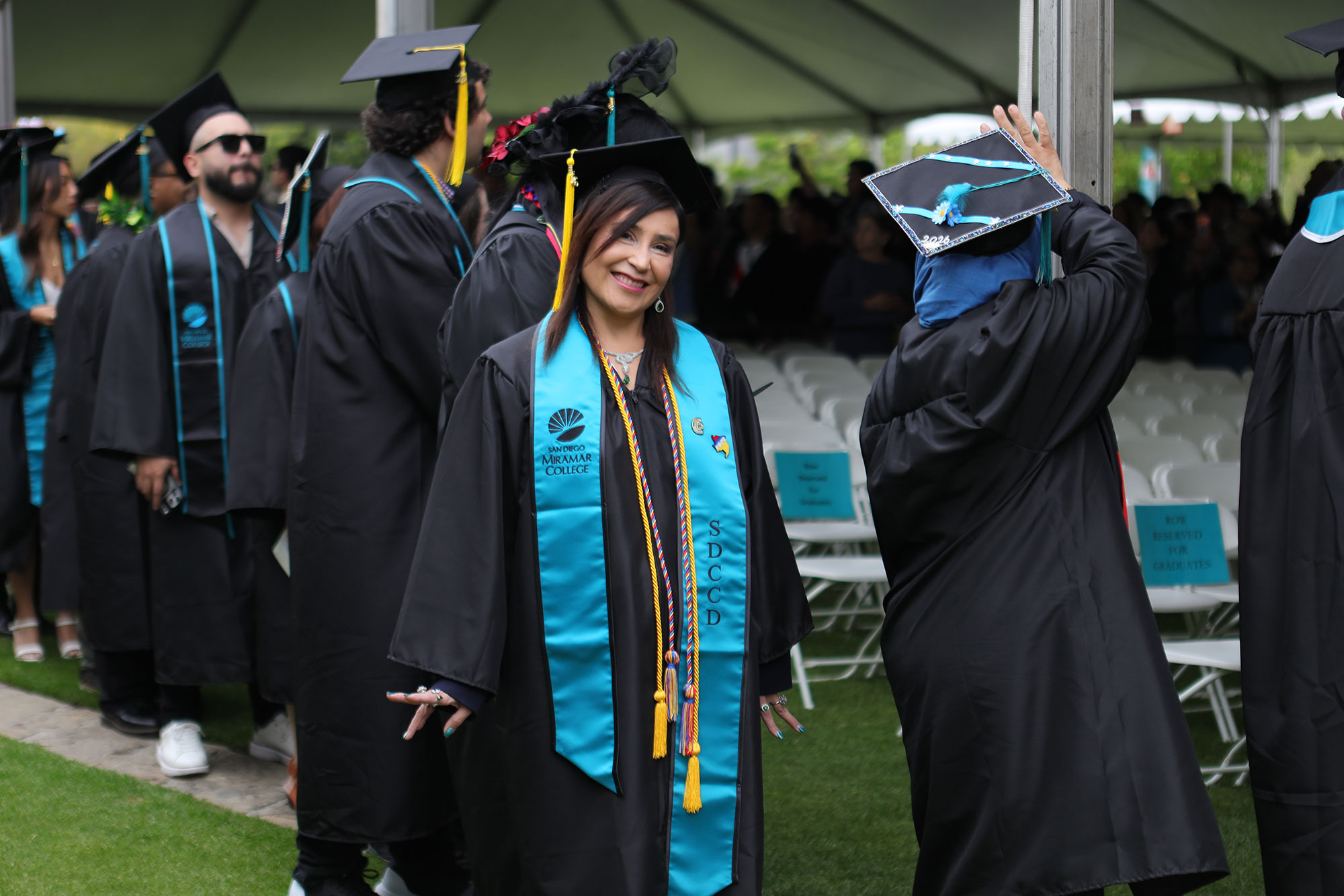 Graduates head to their seats at the start of commencement.
