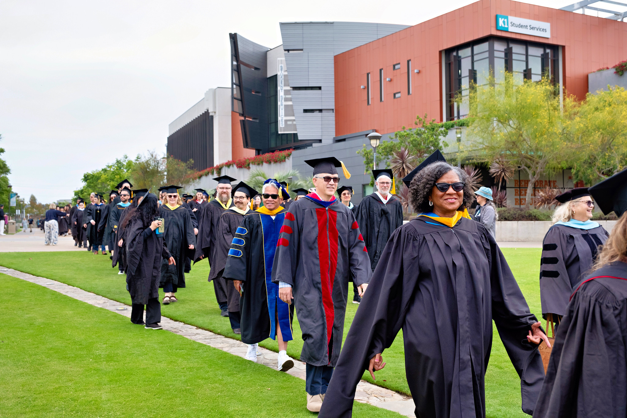 Graduates walking to their seats at the beginning of the ceremony.&nbsp;