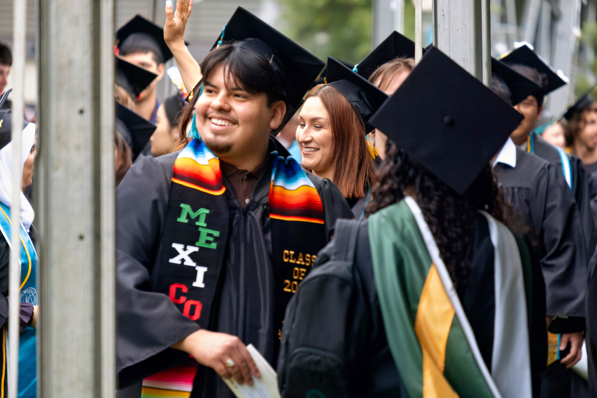 A graduate heads to his seat.&nbsp;