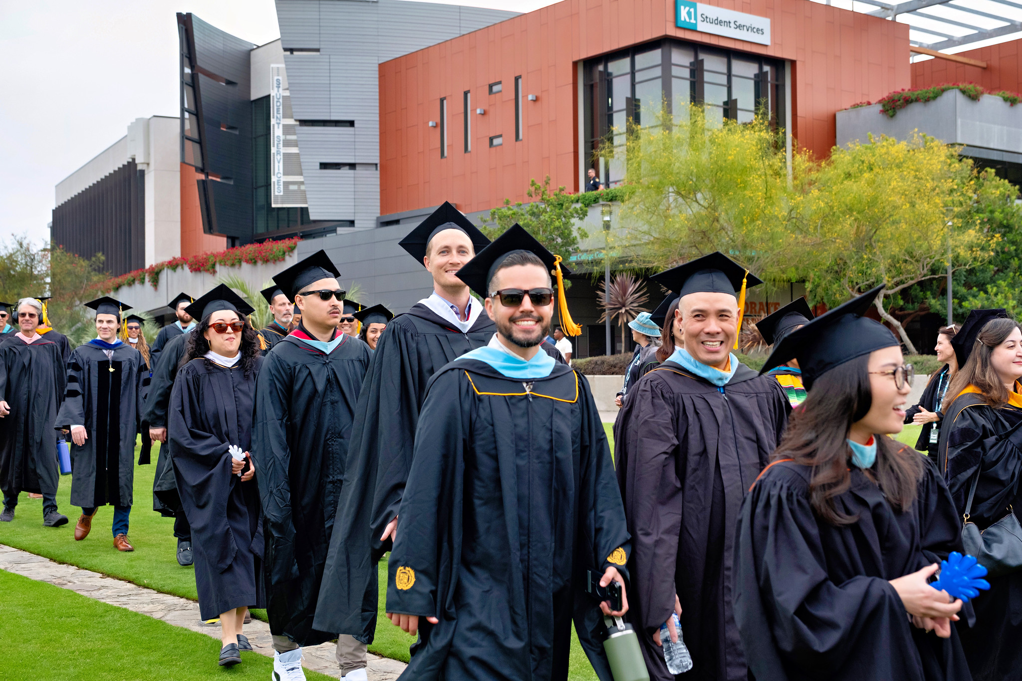 Graduates walking to their seats at the beginning of the ceremony.&nbsp;