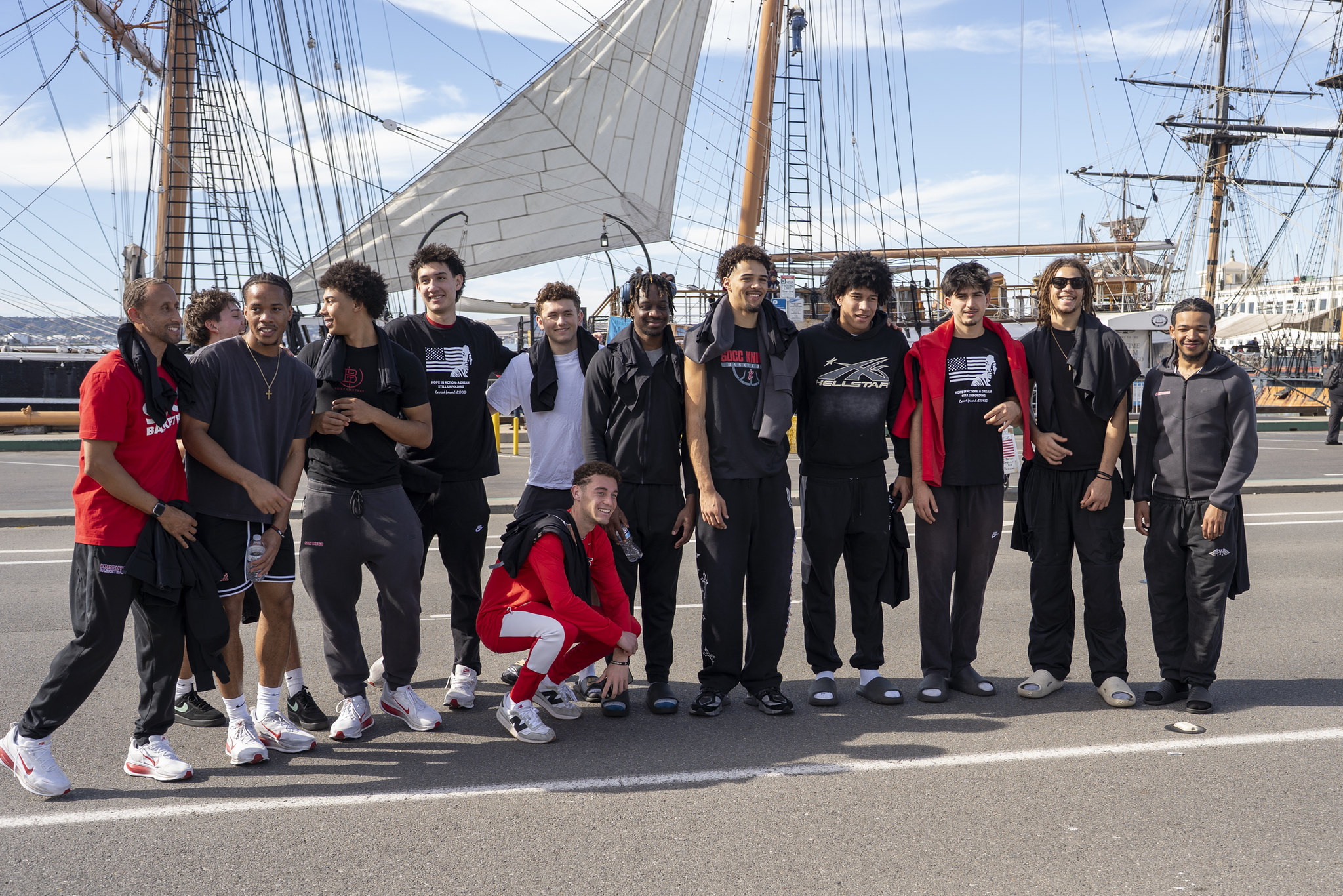 13 athletes from the City College men's basketball team.
