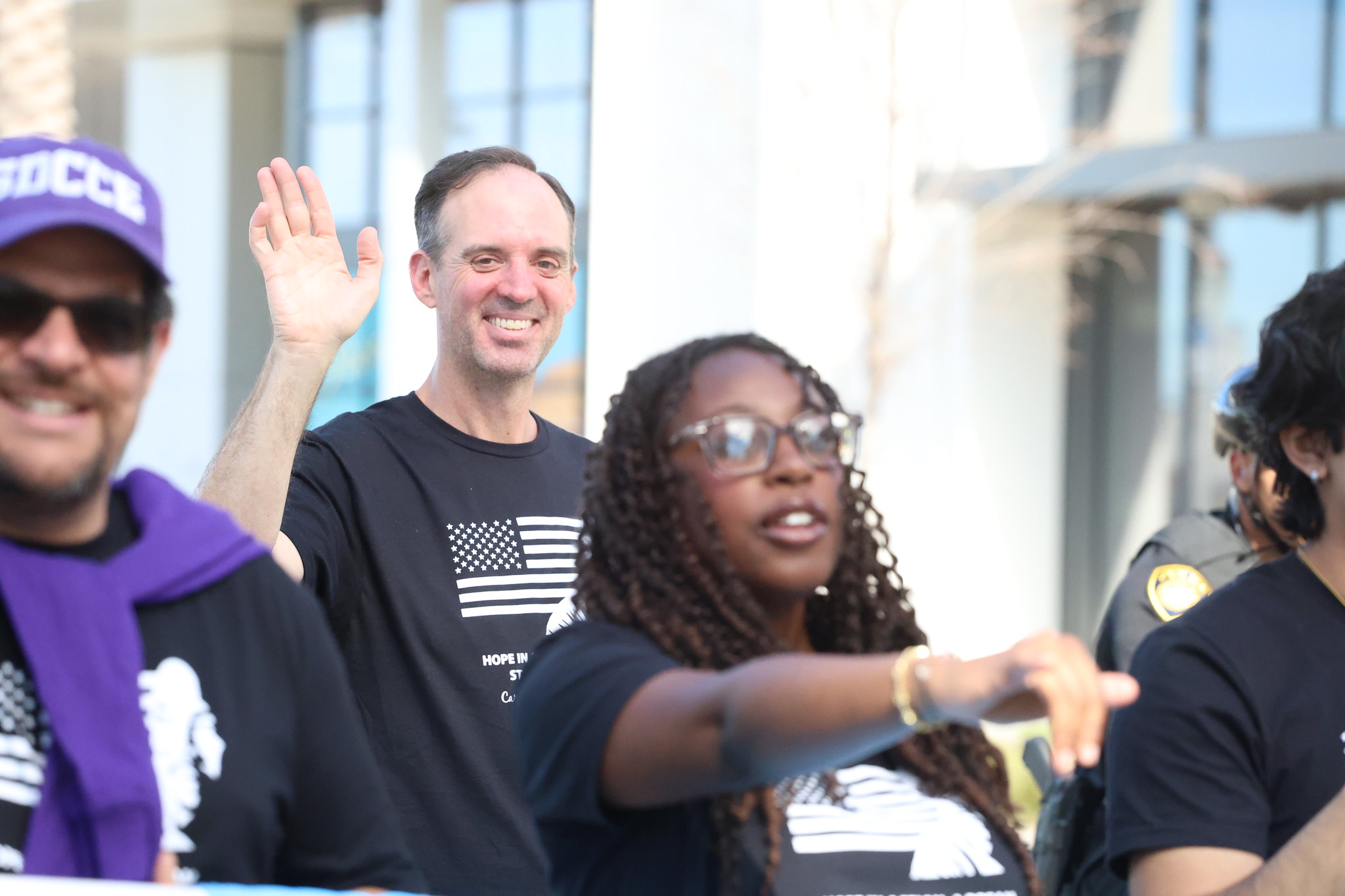 Chancellor Gregory Smith waves while walking in the parade.