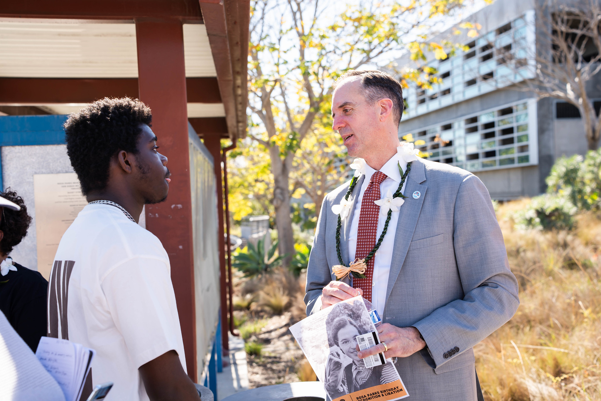 
Chancellor Gregory Smith speaks to an attendee.
