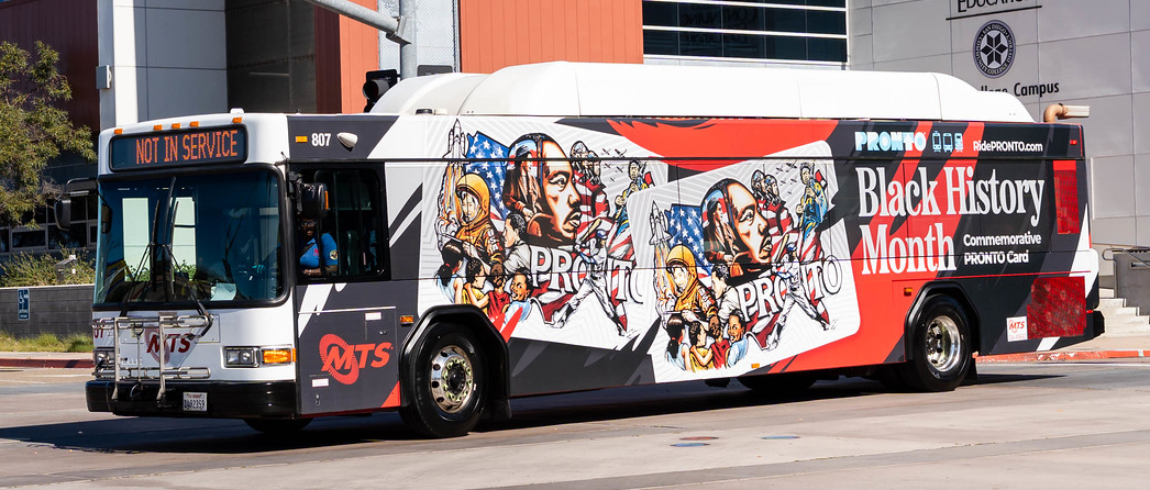 
A bus that has a wrap for Black History Month.
