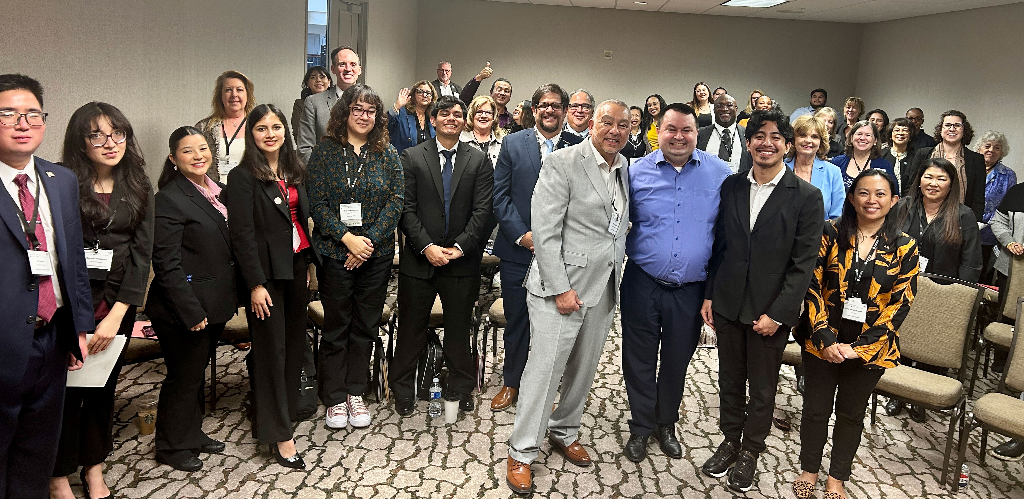 
A group of people at a presentation.
