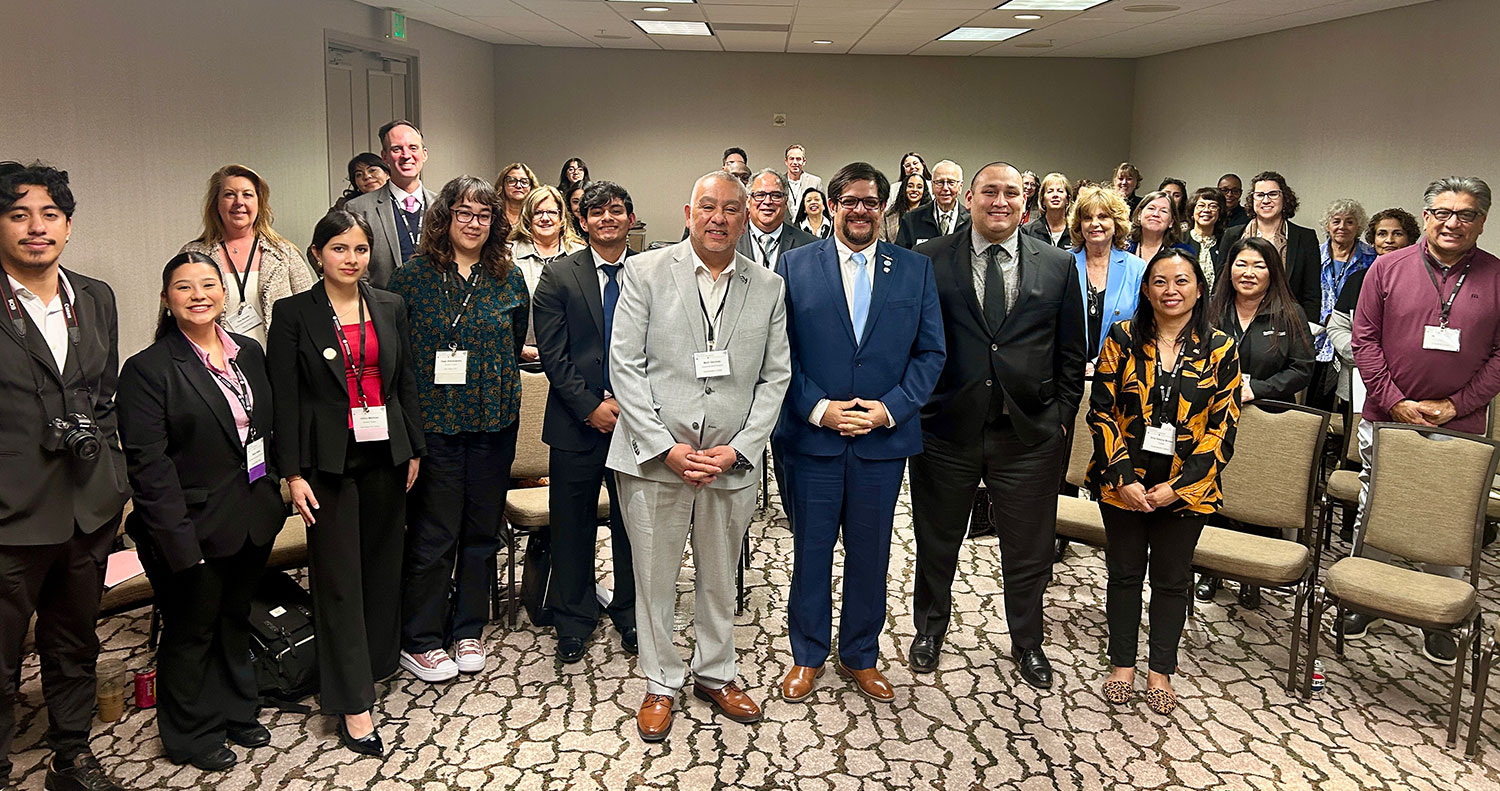 
A group of people at a presentation.
