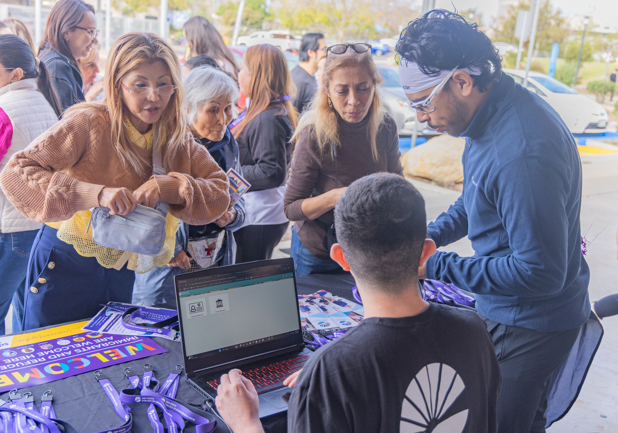 
Four people at a welcome table at Continuing Education.
