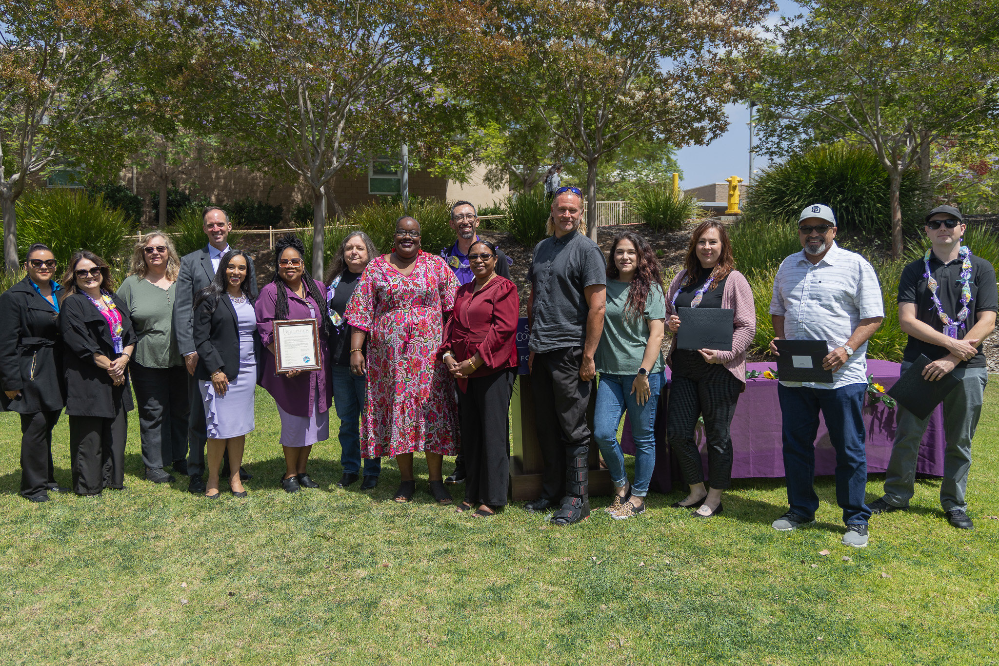 Employees take a group photo College of Continuing Education's event.&nbsp;