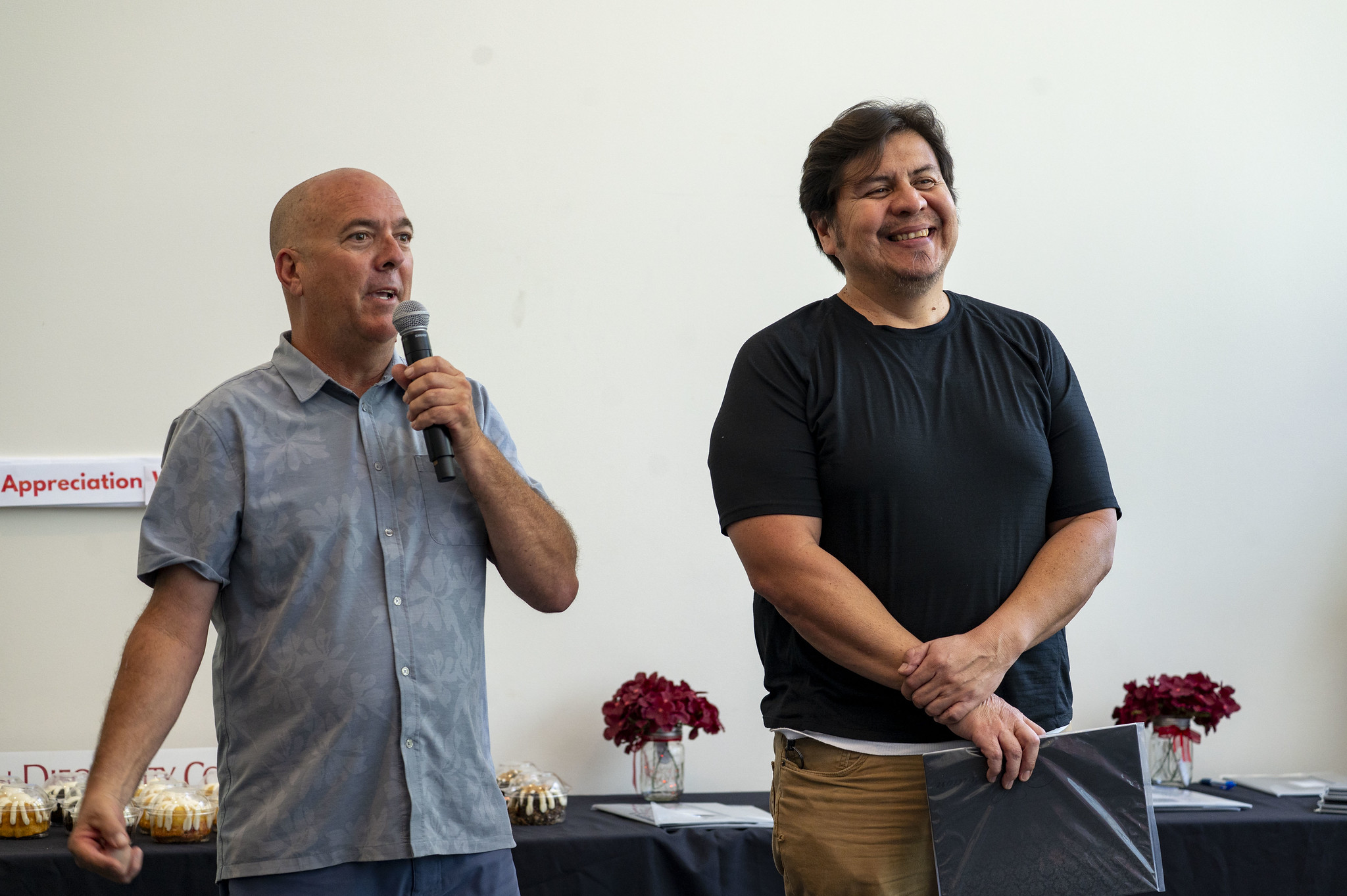 Two presenters at the City College event.