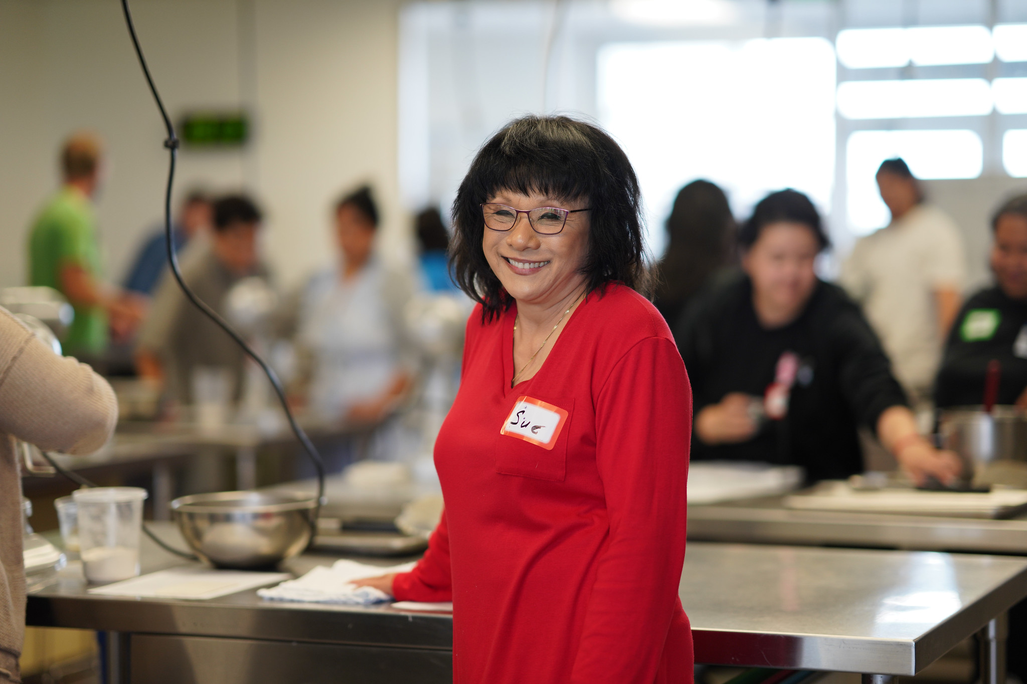 An employee at a Mesa&nbsp; culinary station.